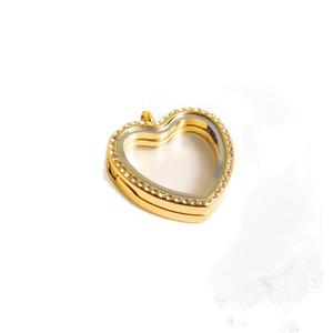 Golden heart floating locket pendant with sparkling crystals and glass display window