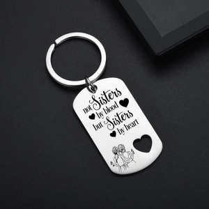Stainless steel sisters keychain with heart cutout and friendship quote on black leather