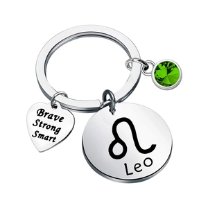 Silver Leo zodiac stainless steel keychain with green birthstone and brave heart pendant