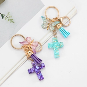 Resin cross keychain set with elegant butterfly pendants and colorful tassels for gifts