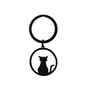 Minimalist matte black stainless steel keychain featuring a sleek cat silhouette pendant