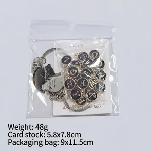 DIY black and white cat alloy keychain with 26 letters pendants in handmade packaging