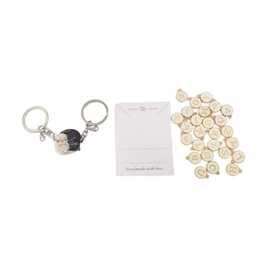 Cat couple keychain set with black and white kitten pendants and 26 golden letter charms
