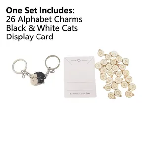 DIY black and white cat alloy keychain set with 26 gold rimmed letter charms for couples