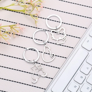 Minimalist hollow stainless steel cat and tiger keychains with elegant animal silhouettes