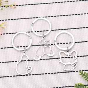 Three-piece hollow animal stainless steel keychains with cat and tiger cutout designs
