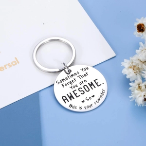 Inspirational engraved stainless steel keychain with polished mirror finish and round tag