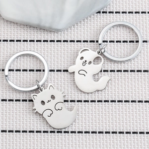Cartoon ghost cat and dog stainless steel keychain set with cute hollowed-out face design