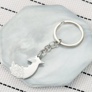 Minimalist silver stainless steel fox keychain with detailed fur texture for couples