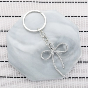 Portachiavi in Metallo con Fiocco Argento Carino Stile Coreano Ciondolo per Borsa in Lega con Texture a Spirale Regalo Donna
