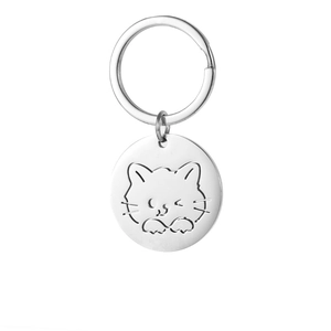 Polished stainless steel cat keychain with hollow-out design on a minimalist keyring