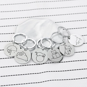 Set of six cute stainless steel cat keychains with various cartoon feline engravings