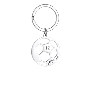 Detail of soccer ball pendant keychain featuring number 12 and custom MEL engraving