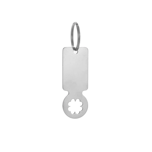 Detail of silver stainless steel shopping trolley token with four-leaf clover cutout design