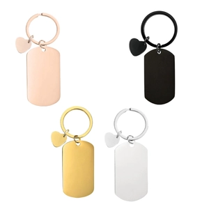 Polished stainless steel dog tag keychains with heart charms in four metallic colors