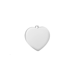 Macro view of mirror polished stainless steel heart pendant with round hanging hole