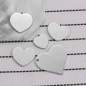 Polished stainless steel heart-shaped pendants in multiple sizes for custom DIY jewelry