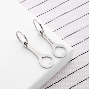 Silver stainless steel trolley token keychain with Happy Shopping engraving and heart cutout