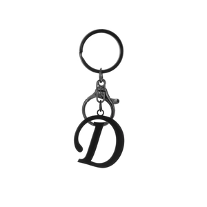 Detailed close-up of matte black letter D alphabet keychain with lobster clasp