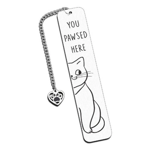 Detail of silver brushed metal bookmark with cat illustration and heart paw pendant