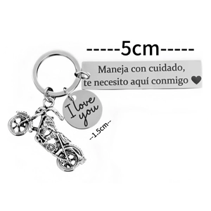 Stainless steel motorcycle keychain with Spanish engraved safety message and charm