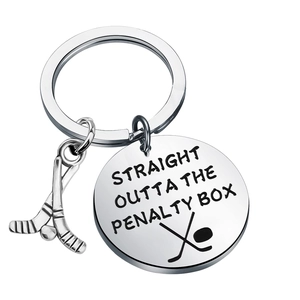 Polished stainless steel hockey keychain featuring penalty box engraving and sports charms