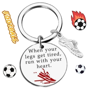 Stainless steel soccer keychain with shoe charm and inspirational quote engraving