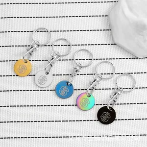 Jetons de caddie en acier inoxydable en cinq couleurs avec signes dollar gravés