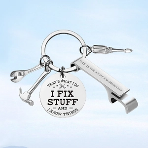 Polished stainless steel I Fix Stuff multi-tool keychain with bottle opener and charms