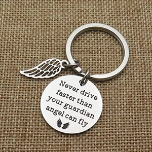 Guardian angel wing keychain with engraved quote Never drive faster on stainless steel
