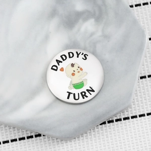 Moneta decisionale in acciaio per neo genitori con design a fumetti Daddy's Turn