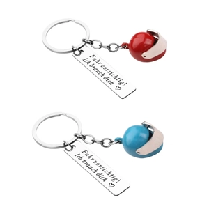 Drive safe stainless steel keychain with red and blue mini helmet pendants and German engraving