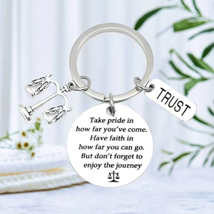 Stainless steel lawyer keychain with balance scale charm and engraved Trust disc