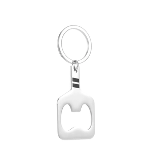 Detailed close-up of a silver stainless steel pickleball racket shaped bottle opener keychain
