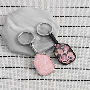 Pink and black pickleball paddle keychains with zinc alloy ring for sports fans
