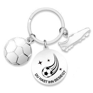 Stainless steel football keychain with football, shoe charms and Du hast ihn besiegt disk