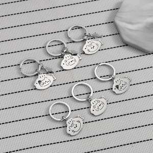 Set of 6 cute stainless steel cat and fish pendants on a round metal keychain ring