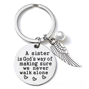 Stainless steel sister keychain with angel wing, pearl bead and engraved heart message