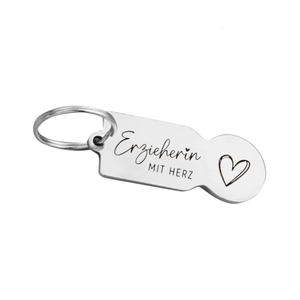 Detail of silver stainless steel keychain with laser engraved Erzieherin mit Herz text