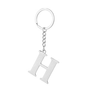 Close-up of silver letter H keychain with brushed metal finish and sturdy ring