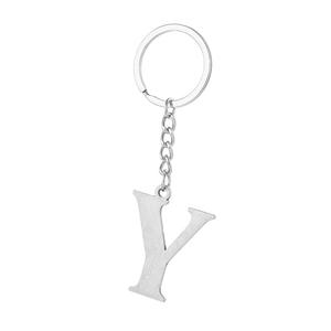 Close-up of brushed stainless steel letter Y pendant with polished key ring and chain