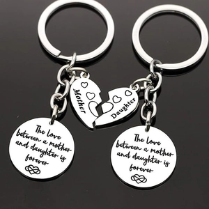 Stainless steel Mother Daughter keychain set with heart pendants and love quote engraving