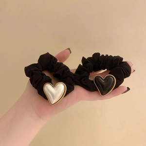 Vintage black scrunchie set with elegant pearl and black heart pendants in gold casing