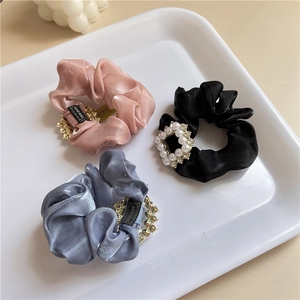 Three-piece set of elegant satin hair scrunchies with faux pearl and rhinestone rings