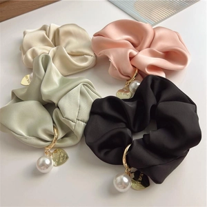 Elegant 4-piece silk scrunchie set with large faux pearls and gold heart charms