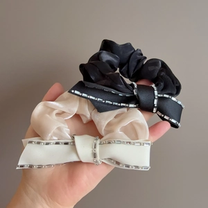 Sparkling rhinestone bow scrunchie set in black and beige satin fabric for low buns
