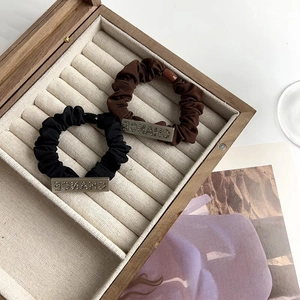 Chic rhinestone hair ties set with Chance metal tag in black and brown fabric