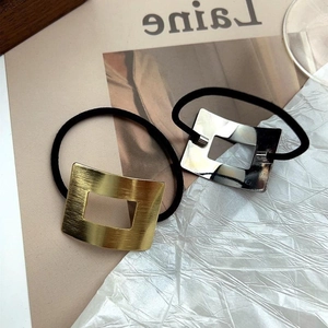 Elastici per capelli con decoro geometrico in metallo spazzolato oro e argento