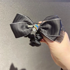 Elegant black bow hair scrunchie with iridescent heart crystal and layered organza