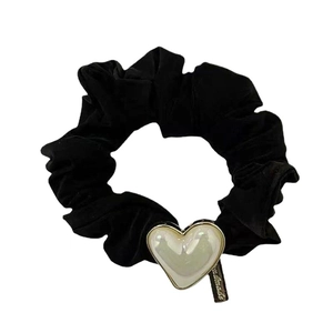 Vintage black velvet scrunchie featuring a heart pearl charm and gold handmade tag